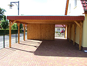 Carport 610x800 cm · Fichte · Schindelblende 2-reihig rot · Abstellraum ca. 400x200 cm
